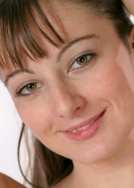 Foxy youthful Honey in skirt showing her butt and spreading her legs 