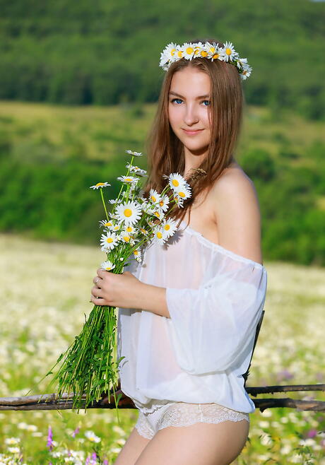 Shapely teen Izabel A in sexy shorts exposes big boobs and spreads her legs outdoor